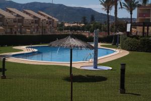 Bazén v ubytovaní Las Marinas Grand Terrace alebo v jeho blízkosti