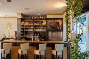 Lounge nebo bar v ubytování Check Inn Hotel Merseburg