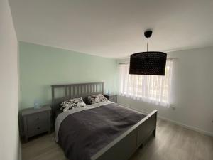 Ein Bett oder Betten in einem Zimmer der Unterkunft Henning 1