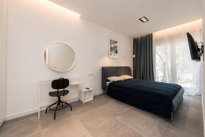 Posteľ alebo postele v izbe v ubytovaní Royal Apartments Zadar