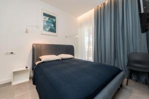 Posteľ alebo postele v izbe v ubytovaní Royal Apartments Zadar