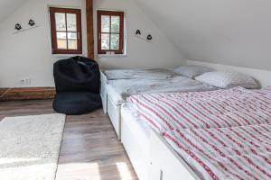 Postel nebo postele na pokoji v ubytování Chalupa v Želivě