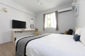 TV a/nebo společenská místnost v ubytování Youngs Hotspring Hotel