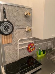 A kitchen or kitchenette at La stanza nel Borgo