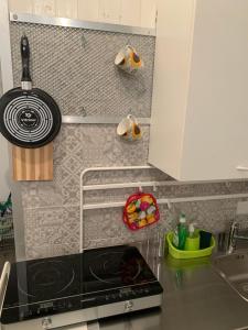 A kitchen or kitchenette at La stanza nel Borgo
