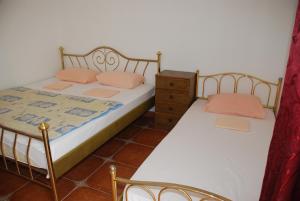 Cama o camas de una habitación en Guest House Nura