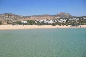 a view of a beach with houses and the water at Sarakiniko in Agiassos