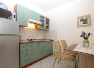 Kuchyňa alebo kuchynka v ubytovaní House Sergio 2206