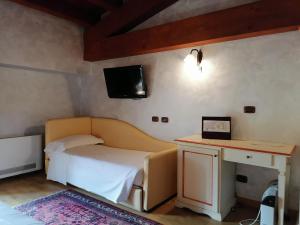 TV a/nebo společenská místnost v ubytování Relais Castrum Boccea