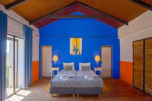 Postel nebo postele na pokoji v ubytování Quinta Tapada Do Gramacho
