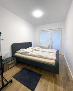 Krevet ili kreveti u jedinici u okviru objekta Danubiana Apartments