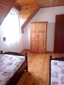 Postel nebo postele na pokoji v ubytování Apartmani Bane