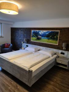 Postel nebo postele na pokoji v ubytování Hotel Anneliese + 37 fotografií