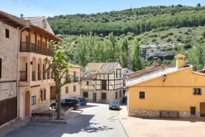 a view of a street in a town with buildings at Casa Gabriela in Palomera