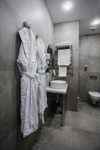 Kylpyhuone majoituspaikassa Sleepers Avia Hotel DME