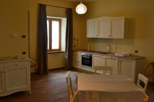 Cucina o angolo cottura di Le Dimore della Via Lattea