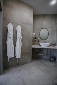 Kylpyhuone majoituspaikassa Sleepers Avia Hotel DME