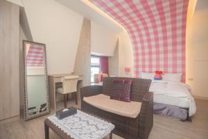 Postel nebo postele na pokoji v ubytování Lusihan B&B