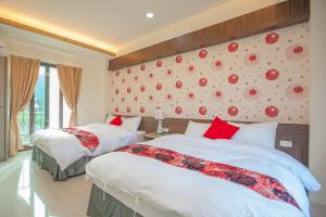 Postel nebo postele na pokoji v ubytování Lusihan B&B