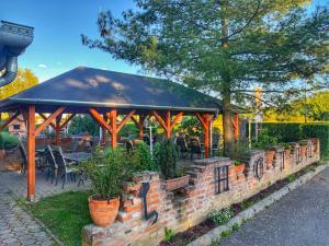 Vonkajšia záhrada v ubytovaní Hotel Zéta