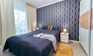 Ένα ή περισσότερα κρεβάτια σε δωμάτιο στο LAGUNA Apartament Polanica Residence 10 - Mini SPA +24 φωτογραφίες