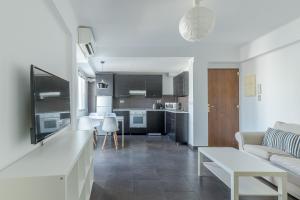 Kuchyňa alebo kuchynka v ubytovaní FUN BUILDING PENTHOUSES by HOMEABOUT