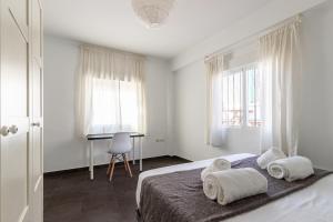 Posteľ alebo postele v izbe v ubytovaní FUN BUILDING PENTHOUSES by HOMEABOUT