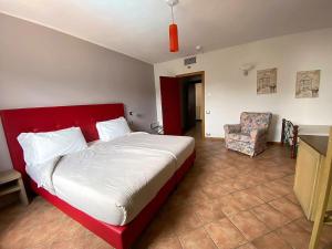 Posteľ alebo postele v izbe v ubytovaní Hotel Lenno
