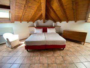 Posteľ alebo postele v izbe v ubytovaní Hotel Lenno