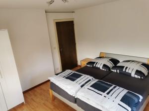 Posteľ alebo postele v izbe v ubytovaní W45 Dornbirn Hills