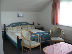 Postel nebo postele na pokoji v ubytování Panorama Hotel Freudenberg