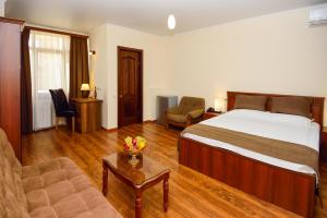 Postel nebo postele na pokoji v ubytování Hotel British House
