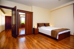 Postel nebo postele na pokoji v ubytování Hotel British House