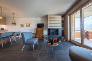 Televiisor ja/või meelelahutuskeskus majutusasutuses Apartment La Forêt 5 - Spa access - Centre Station