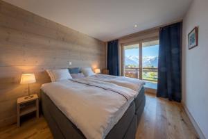 Voodi või voodid majutusasutuse Apartment La Forêt 5 - Spa access - Centre Station toas