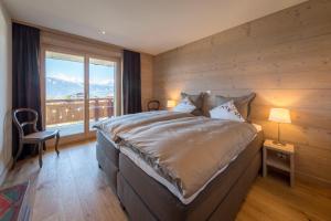 Voodi või voodid majutusasutuse Apartment La Forêt 5 - Spa access - Centre Station toas