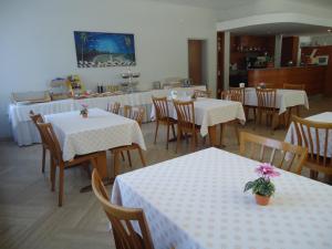 Restavracija oz. druge možnosti za prehrano v nastanitvi Osteria Belvedere