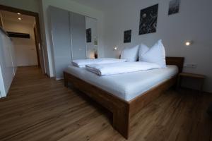 Posteľ alebo postele v izbe v ubytovaní Apartment Nora