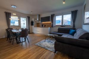 a living room with a couch and a table at Apartment Nora in Ehrwald