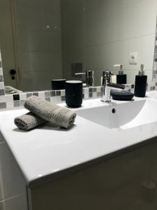 a bathroom counter with a sink and a mirror at Sea Light Seaview Vista Mar Apartment - Luz, Lagos in Luz +30 photos