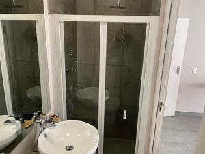 Koupelna v ubytování Cozy Corner + 7 fotografií