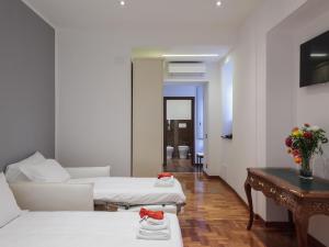 TV a/nebo společenská místnost v ubytování Lh Royal Suites Terrace