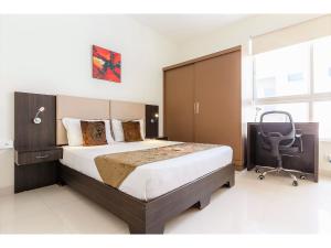 Katil atau katil-katil dalam bilik di BluO Studio Hitech City - Gym, TT, Terrace Garden