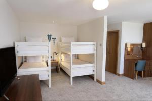 Cama ou camas em um quarto em Esplanade Hotel