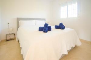 Postel nebo postele na pokoji v ubytování Apartamento Marina Casares + 14 fotografií