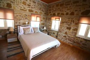 Ένα ή περισσότερα κρεβάτια σε δωμάτιο στο Santa Barbara Home Perivoli