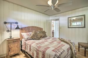 a bedroom with a bed and a ceiling fan at Lakefront High Point House with Furnished Deck! in High Point