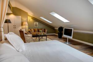 Postel nebo postele na pokoji v ubytování Grand Hotel Don Gregorio