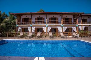 Swimmingpoolen hos eller tæt på Pousada Refugio da Harmonia