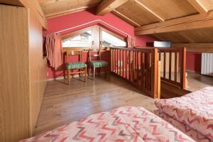 Кровать или кровати в номере Baita Miralago - Appartamenti Abar